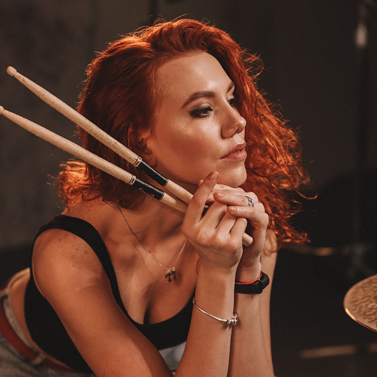 photo of Victoria Danilevskaya holding sticks